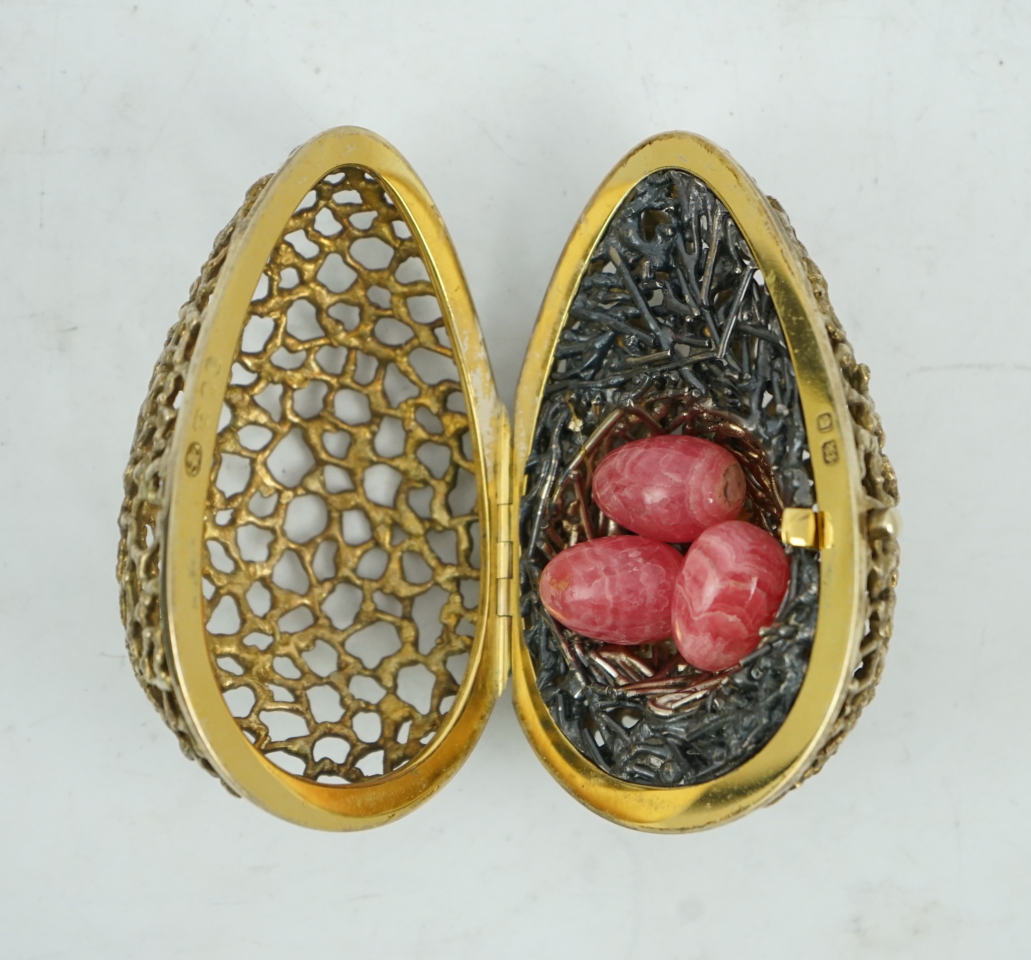An Elizabeth II pierced silver gilt surprise egg by Stuart Devlin